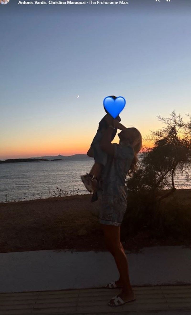 σπυροπουλου ηλιοβασιλεμα με παιδι.